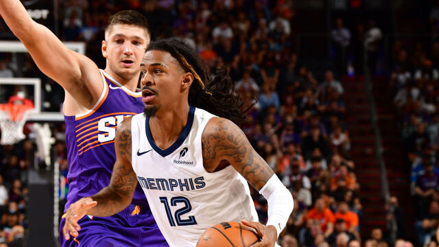 PHOENIX, AZ - OCTOBER 29: Ja Morant #12 of the Memphis Grizzlies drives to the basket during the game against the Phoenix Suns on October 29, 2025 at PHX Arena in Phoenix, Arizona. Mandatory Copyright Notice: Copyright 2025 NBAE