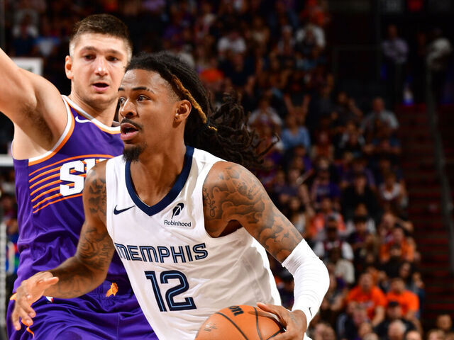 PHOENIX, AZ - OCTOBER 29: Ja Morant #12 of the Memphis Grizzlies drives to the basket during the game against the Phoenix Suns on October 29, 2025 at PHX Arena in Phoenix, Arizona. Mandatory Copyright Notice: Copyright 2025 NBAE