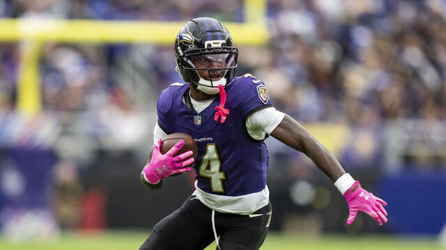 BALTIMORE, MARYLAND - OCTOBER 12: Zay Flowers #4 of the Baltimore Ravens runs with the ball during an NFL football game against the Los Angeles Rams at M&T Bank Stadium on October 12, 2025 in Baltimore, Maryland.