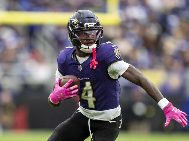 BALTIMORE, MARYLAND - OCTOBER 12: Zay Flowers #4 of the Baltimore Ravens runs with the ball during an NFL football game against the Los Angeles Rams at M&T Bank Stadium on October 12, 2025 in Baltimore, Maryland.