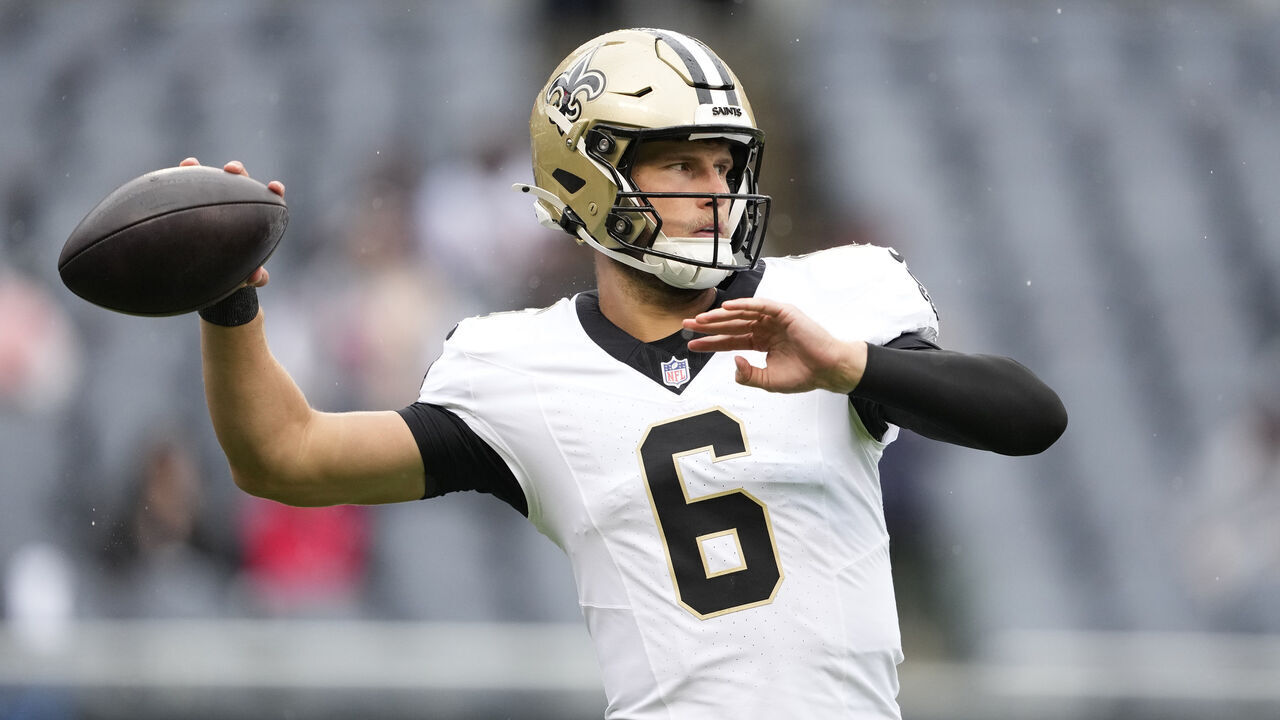 CHICAGO, ILLINOIS - OCTOBER 19: Tyler Shough #6 of the New Orleans Saints warms up before a game against the Chicago Bears at Soldier Field on October 19, 2025 in Chicago, Illinois.