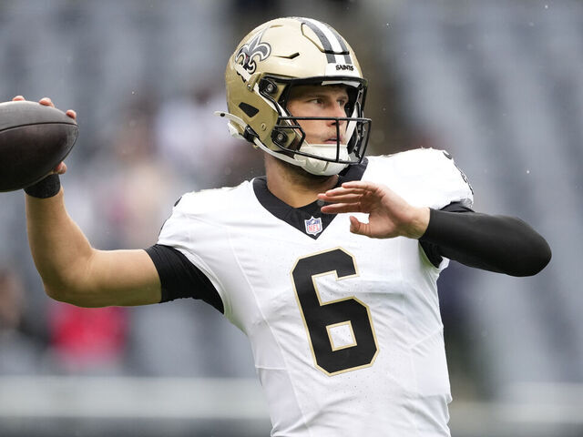 CHICAGO, ILLINOIS - OCTOBER 19: Tyler Shough #6 of the New Orleans Saints warms up before a game against the Chicago Bears at Soldier Field on October 19, 2025 in Chicago, Illinois.