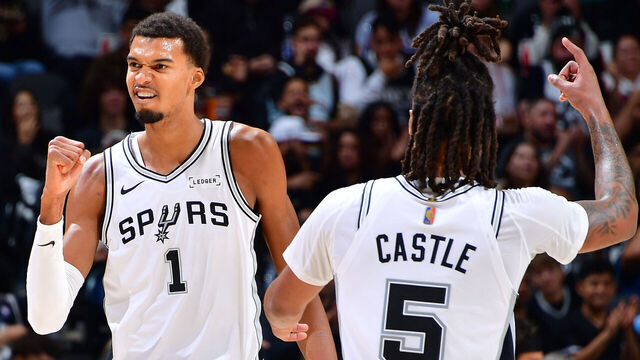 SAN ANTONIO, TX - OCTOBER 30: Victor Wembanyama #1 and Stephon Castle #5 of the San Antonio Spurs celebrates during the game against the Miami Heat on October 30, 2025 at the Frost Bank Center in San Antonio, Texas. Mandatory Copyright Notice: Copyright 2025 NBAE (Photos by Michael Gonzales/NBAE via Getty Images)