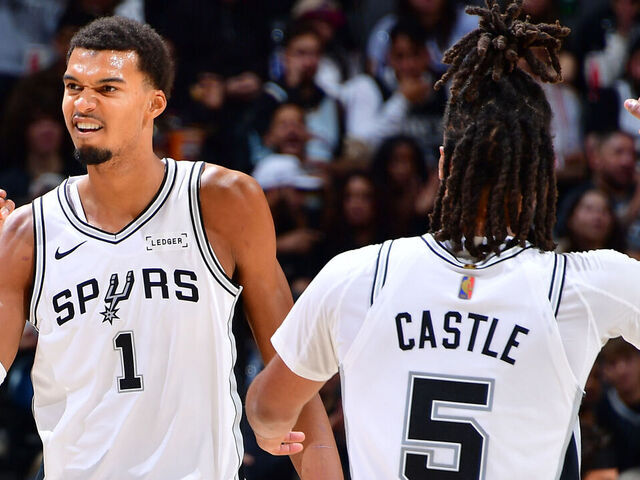 SAN ANTONIO, TX - OCTOBER 30: Victor Wembanyama #1 and Stephon Castle #5 of the San Antonio Spurs celebrates during the game against the Miami Heat on October 30, 2025 at the Frost Bank Center in San Antonio, Texas. Mandatory Copyright Notice: Copyright 2025 NBAE (Photos by Michael Gonzales/NBAE via Getty Images)