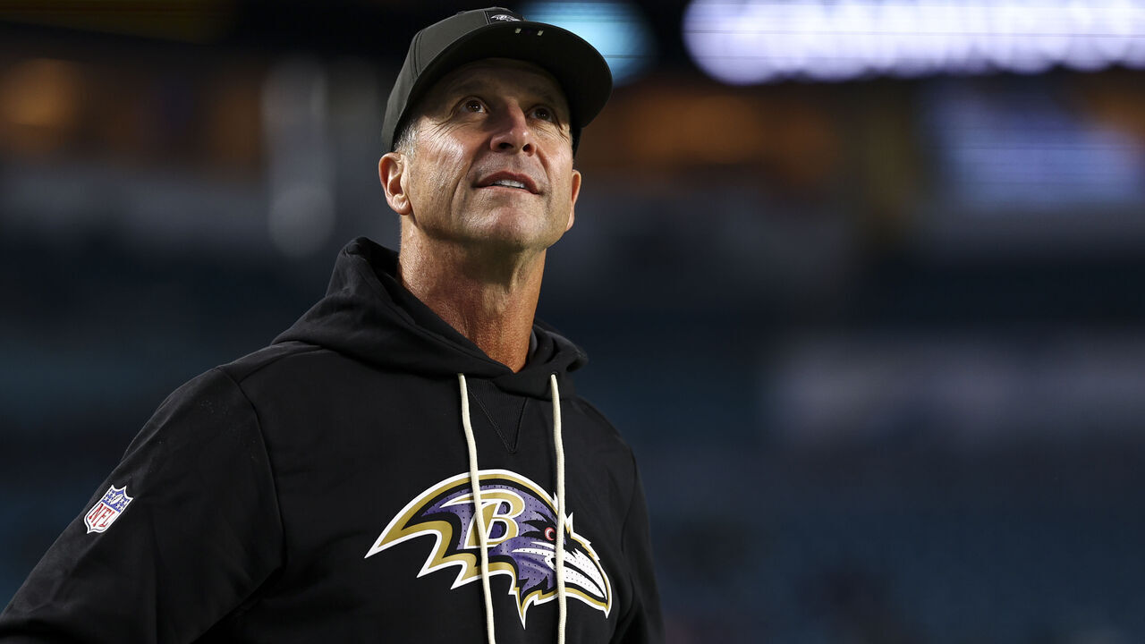 MIAMI GARDENS, FLORIDA - OCTOBER 30: Head coach John Harbaugh of the Baltimore Ravens stands on the field prior to an NFL football game against the Miami Dolphins at Hard Rock Stadium on October 30, 2025 in Miami Gardens, Florida.