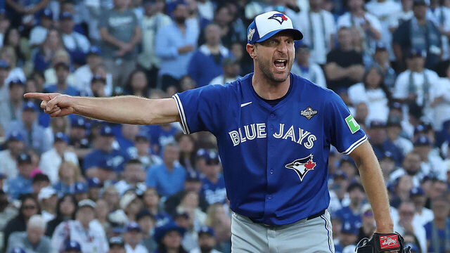 LOS ANGELES , CA - OCTOBER 27 - Toronto Blue Jays pitcher Max Scherzer (31) asks the first base umpire for an appeal as the Toronto Blue Jays fell to the Los Angeles Dodgers 6-5 in an 18 inning affair in game three of the MLB World Series at Dodgers Stadium in Los Angeles . October 27, 2025. (Steve Russell/Toronto Star via Getty Images)