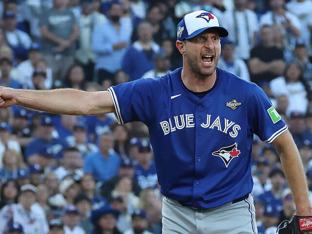 LOS ANGELES , CA - OCTOBER 27 - Toronto Blue Jays pitcher Max Scherzer (31) asks the first base umpire for an appeal as the Toronto Blue Jays fell to the Los Angeles Dodgers 6-5 in an 18 inning affair in game three of the MLB World Series at Dodgers Stadium in Los Angeles . October 27, 2025. (Steve Russell/Toronto Star via Getty Images)