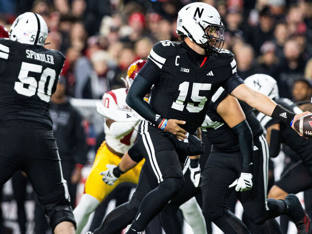 LINCOLN, NE - NOVEMBER 01: Nebraska quarterback Dylan Raiola (15) hands the ball off in the second quarter between the USC Trojans and the Nebraska Cornhuskers on November 01, 2025, at Memorial Stadium in Lincoln, NE.