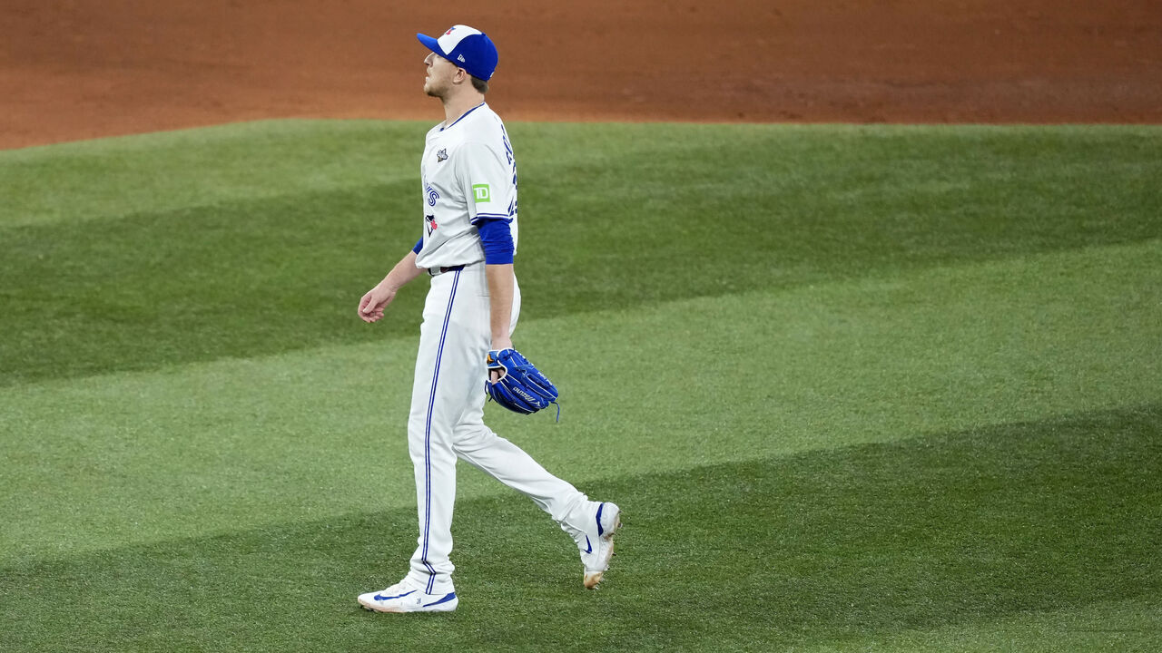 TORONTO, ONTARIO - NOVEMBER 01: Jeff Hoffman #23 of the Toronto Blue Jays walks to the dugout following the top of the ninth inning against the Los Angeles Dodgers in game seven of the 2025 World Series at Rogers Center on November 01, 2025 in Toronto, Ontario.