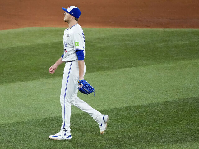 TORONTO, ONTARIO - NOVEMBER 01: Jeff Hoffman #23 of the Toronto Blue Jays walks to the dugout following the top of the ninth inning against the Los Angeles Dodgers in game seven of the 2025 World Series at Rogers Center on November 01, 2025 in Toronto, Ontario.