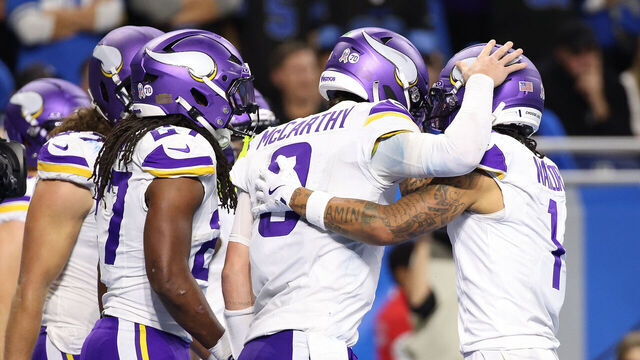 DETROIT, MICHIGAN - NOVEMBER 02: Jalen Nailor #1 of the Minnesota Vikings celebrates a touchdown with J.J. McCarthy #9 during the third quarter against the Detroit Lions in the game at Ford Field on November 02, 2025 in Detroit, Michigan.