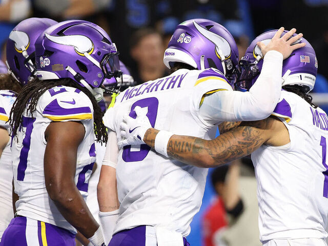 DETROIT, MICHIGAN - NOVEMBER 02: Jalen Nailor #1 of the Minnesota Vikings celebrates a touchdown with J.J. McCarthy #9 during the third quarter against the Detroit Lions in the game at Ford Field on November 02, 2025 in Detroit, Michigan.