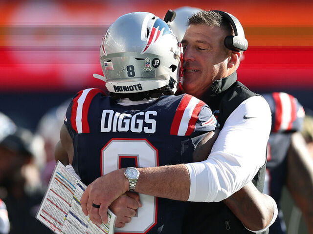 FOXBOROUGH, MASSACHUSETTS - NOVEMBER 02: Stefon Diggs #8 of the New England Patriots hugs head coach Mike Vrabel of the New England Patriots during the first half against the Atlanta Falcons in the game at Gillette Stadium on November 02, 2025 in Foxborough, Massachusetts.