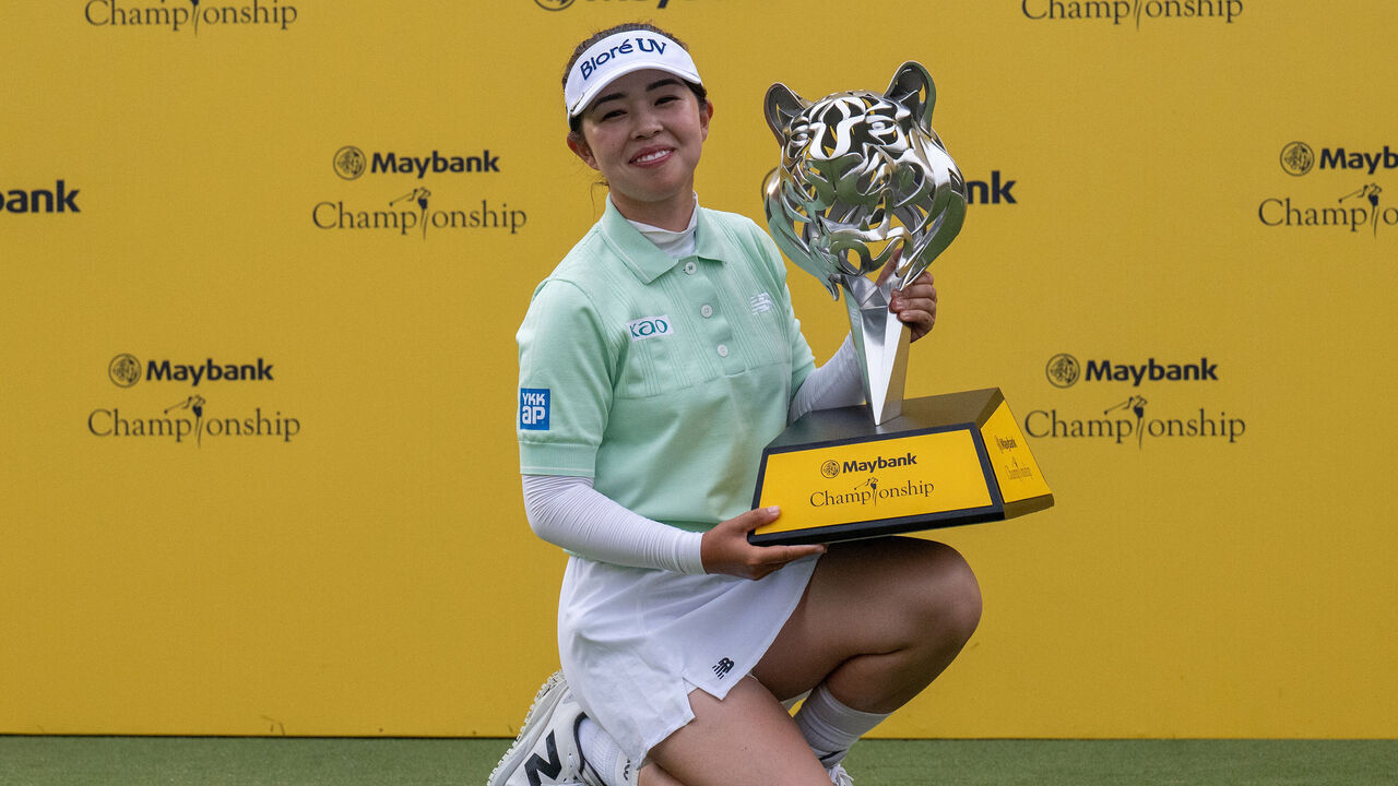 KUALA LUMPUR, MALAYSIA - NOVEMBER 02: Miyu Yamashita of Japan holds the trophy after winning the Maybank Championship 2025 at Kuala Lumpur Golf & Country Club on November 02, 2025 in Kuala Lumpur, Malaysia.