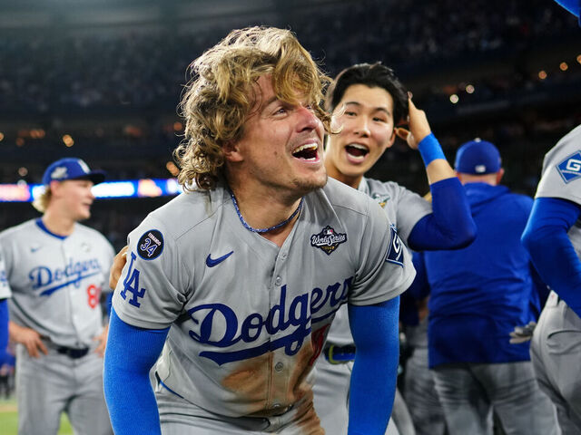 TORONTO, ON - NOVEMBER 01: Enrique Hernández #8 of the Los Angeles Dodgers celebrates with teammates on the field after defeating the Toronto Blue Jays in Game Seven of the 2025 World Series presented by Capital One at Rogers Centre on Saturday, November 1, 2025 in Toronto, Ontario, Canada.