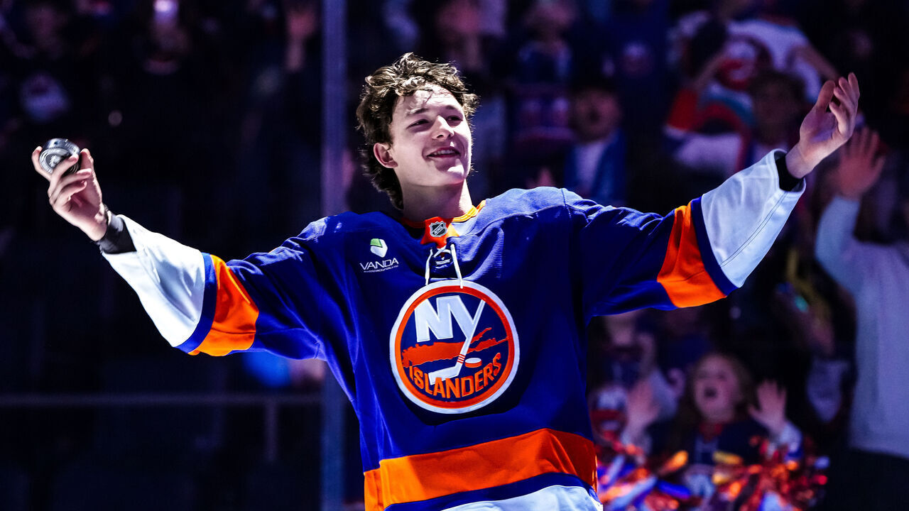 ELMONT, NEW YORK - NOVEMBER 02: Matthew Schaefer #48 of the New York Islanders waves to the crowd after being named first star of the game vs. the Columbus Blue Jackets at UBS Arena on November 2, 2025 in Elmont, New York.