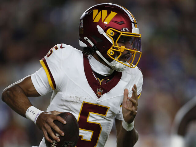LANDOVER, MD - NOVEMBER 02: Washington Commanders quarterback Jayden Daniels (5) rushes upfield during the Seattle Seahawks game versus the Washington Commanders at Northwest Stadium on November 02, 2025, in Landover, MD.