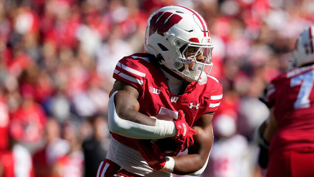 MADISON, WISCONSIN - OCTOBER 18: Dilin Jones #7 of the Wisconsin Badgers carries the ball during the game against the Ohio State Buckeyes at Camp Randall Stadium on October 18, 2025 in Madison, Wisconsin.
