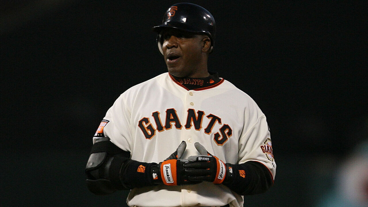 Barry Bonds claps after reaching second base on a 3rd inning double. ; GIANTS V. CUBS at ATT&T PARK. ; Photo: Mark Costantini / S.F. Chronicle ; ; ; Ran on: 12-01-2007 ; ; Ran on: 12-01-2007
