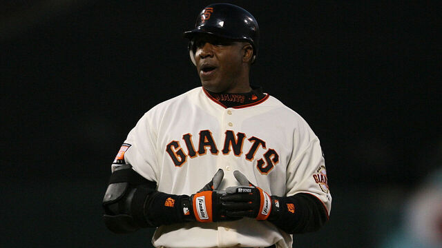 Barry Bonds claps after reaching second base on a 3rd inning double. ; GIANTS V. CUBS at ATT&T PARK. ; Photo: Mark Costantini / S.F. Chronicle ; ; ; Ran on: 12-01-2007 ; ; Ran on: 12-01-2007