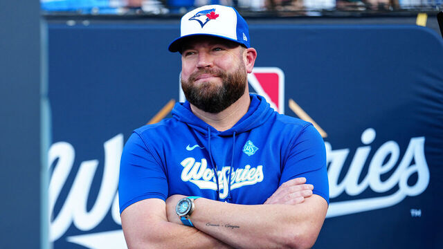 LOS ANGELES, CA - OCTOBER 27: Manager John Schneider #14 of the Toronto Blue Jays looks on prior to Game Three of the 2025 World Series presented by Capital One between the Toronto Blue Jays and the Los Angeles Dodgers at Dodger Stadium on Monday, October 27, 2025 in Los Angeles, California.