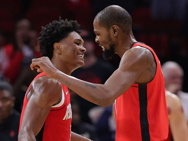HOUSTON, TEXAS - NOVEMBER 03: Amen Thompson #1 of the Houston Rockets and Kevin Durant #7 of the Houston Rockets celebrate during the second half against the Dallas Mavericks at Toyota Center on November 03, 2025 in Houston, Texas.
