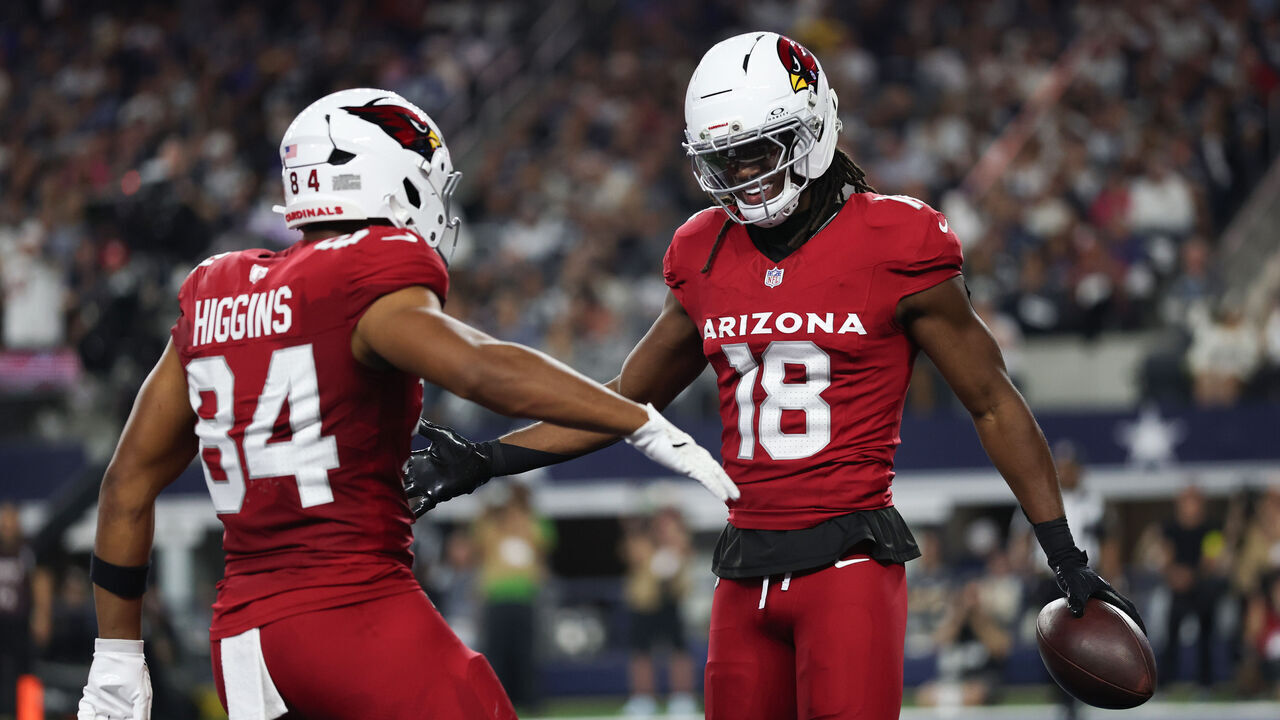 ARLINGTON, TEXAS - NOVEMBER 03: Marvin Harrison Jr. #18 of the Arizona Cardinals celebrates his touchdown with Elijah Higgins against the Dallas Cowboys during the second quarter in the game at AT&T Stadium on November 03, 2025 in Arlington, Texas.