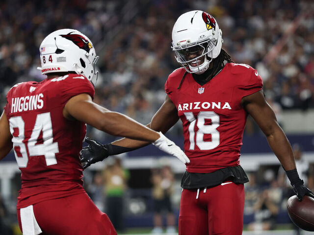 ARLINGTON, TEXAS - NOVEMBER 03: Marvin Harrison Jr. #18 of the Arizona Cardinals celebrates his touchdown with Elijah Higgins against the Dallas Cowboys during the second quarter in the game at AT&T Stadium on November 03, 2025 in Arlington, Texas.