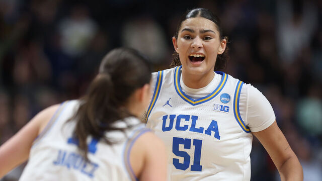 SPOKANE, WASHINGTON - MARCH 30: Lauren Betts #51 of the UCLA Bruins reacts with Gabriela Jaquez #11 during the second half against the LSU Lady Tigers in the Elite Eight round of the NCAA Women's Basketball Tournament at Spokane Arena on March 30, 2025 in Spokane, Washington.