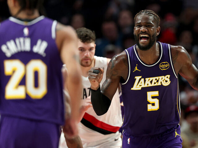 PORTLAND, OREGON - NOVEMBER 03: Deandre Ayton #5 reacts after a basket by Nick Smith Jr. #20 of the Los Angeles Lakers against the Portland Trail Blazers at Moda Center on November 03, 2025 in Portland, Oregon. NOTE TO USER: User expressly acknowledges and agrees that, by downloading and/or using this Photograph, user is consenting to the terms and conditions of the Getty Images License Agreement.