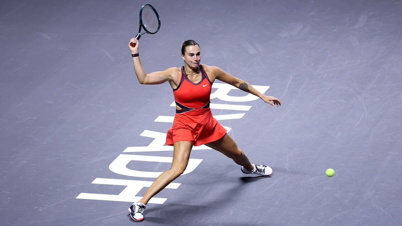 RIYADH, SAUDI ARABIA - NOVEMBER 02: Aryna Sabalenka plays a forehand against Jasmine Paolini of Italy during their Round Robin Singles match on day two of the WTA Finals Riyadh as part of the Hologic WTA Tour 2025 at King Saud University Indoor Arena on November 02, 2025 in Riyadh, Saudi Arabia.