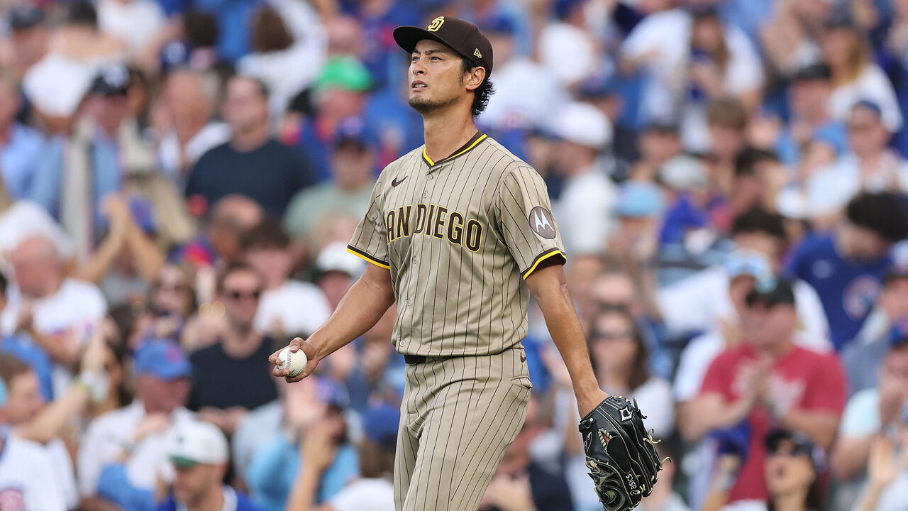 CHICAGO, ILLINOIS - OCTOBER 02: Yu Darvish #11 of the San Diego Padres reacts after allowing a Double to Seiya Suzuki #27 of the Chicago Cubs (not pictured) in the second inning in game three of the National League Wild Card Series at Wrigley Field on October 02, 2025 in Chicago, Illinois.