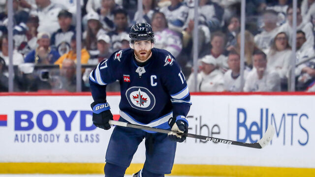 WINNIPEG, CANADA - MAY 4: Adam Lowry #17 of the Winnipeg Jets follows the play down the ice during third period action against the St. Louis Blues in Game Seven of the First Round of the 2025 Stanley Cup Playoffs at the Canada Life Centre on May 4, 2025 in Winnipeg, Manitoba, Canada. The Jets eliminated the Blues 4-3 in double overtime and advance to the Second Round.