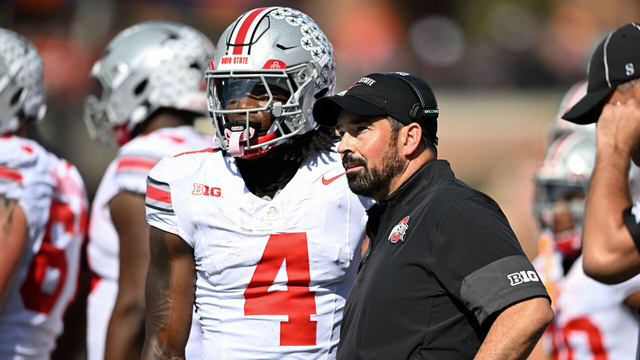 CHAMPAIGN, IL - OCTOBER 11: Ohio State Buckeyes WR Jeremiah Smith (4) with Ohio State Buckeyes head coach Ryan Day during a college football game between the Ohio State Buckeyes and Illinois Fighting Illini on October 11, 2025 at Gies Memorial Stadium in Champaign, IN