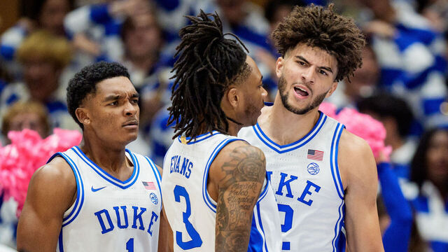DURHAM, NORTH CAROLINA - OCTOBER 21: (R-L) Cameron Boozer #12 of the Duke Blue Devils celebrates with Isaiah Evans #3 and Caleb Foster #1 during their game against the UCF Knights at Cameron Indoor Stadium on October 21, 2025 in Durham, North Carolina.