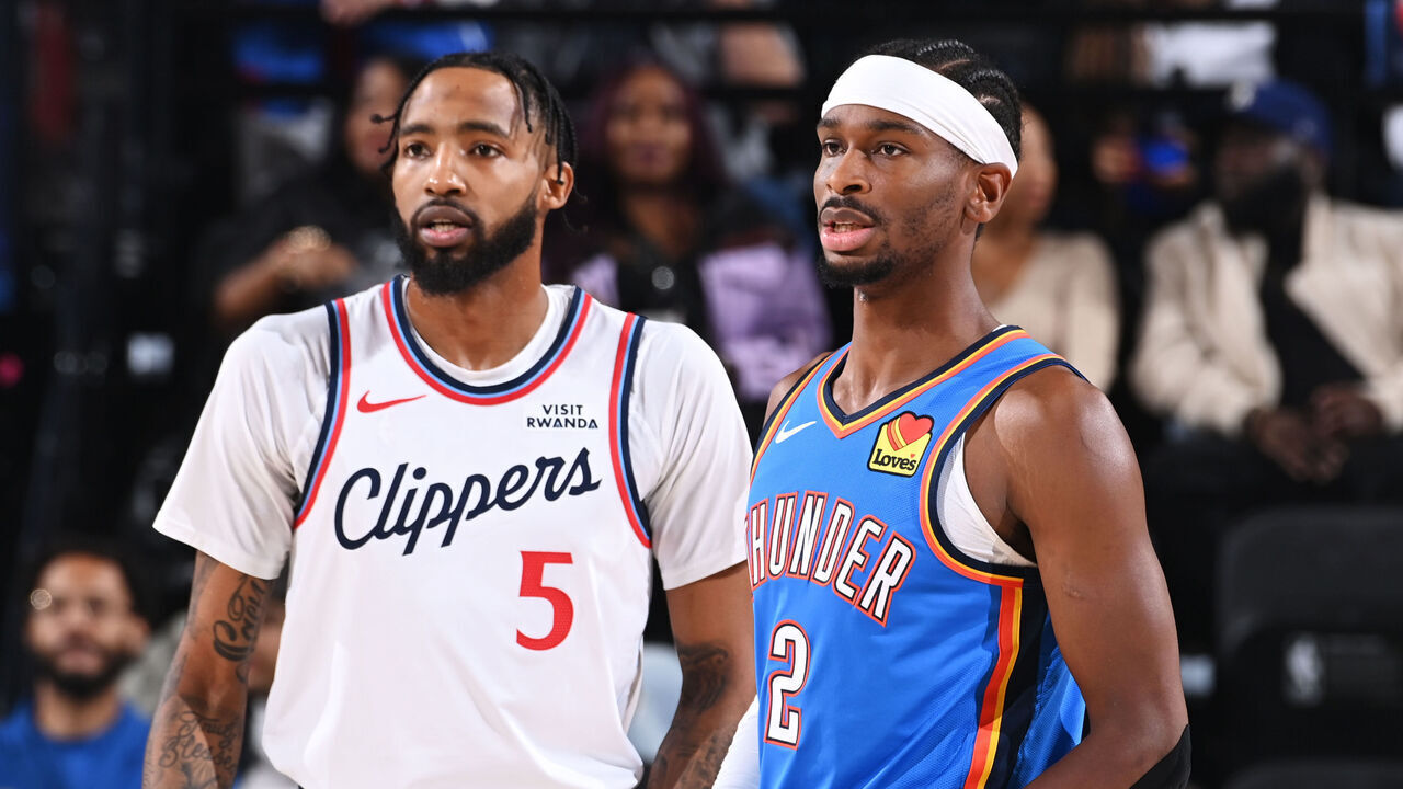 INGLEWOOD, CA - NOVEMBER 4: Derrick Jones Jr. #5 of the LA Clippers and Shai Gilgeous-Alexander #2 of the Oklahoma City Thunder look on during the game on November 4, 2025 at Intuit Dome in Los Angeles, California. NOTE TO USER: User expressly acknowledges and agrees that, by downloading and/or using this Photograph, user is consenting to the terms and conditions of the Getty Images License Agreement. Mandatory Copyright Notice: Copyright 2025 NBAE
