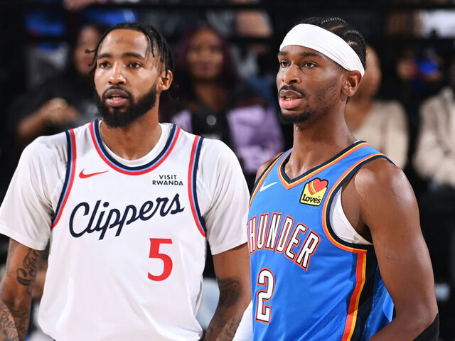 INGLEWOOD, CA - NOVEMBER 4: Derrick Jones Jr. #5 of the LA Clippers and Shai Gilgeous-Alexander #2 of the Oklahoma City Thunder look on during the game on November 4, 2025 at Intuit Dome in Los Angeles, California. NOTE TO USER: User expressly acknowledges and agrees that, by downloading and/or using this Photograph, user is consenting to the terms and conditions of the Getty Images License Agreement. Mandatory Copyright Notice: Copyright 2025 NBAE