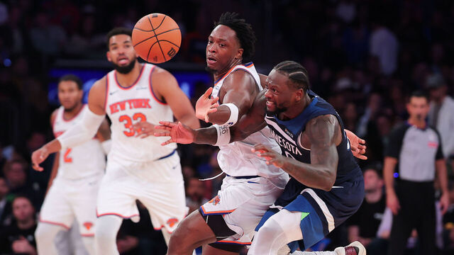NEW YORK, NEW YORK - NOVEMBER 05: OG Anunoby #8 of the New York Knicks steals the ball from Julius Randle #30 of the Minnesota Timberwolves during the third quarter of the game at Madison Square Garden on November 05, 2025 in New York City.