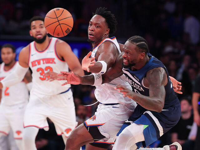 NEW YORK, NEW YORK - NOVEMBER 05: OG Anunoby #8 of the New York Knicks steals the ball from Julius Randle #30 of the Minnesota Timberwolves during the third quarter of the game at Madison Square Garden on November 05, 2025 in New York City.
