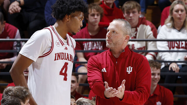 BLOOMINGTON, IN - NOVEMBER 05: Head coach Darian Devries of the Indiana Hoosiers talks to Sam Alexis #4 during a college basketball game against the Alabama A&M Bulldogs on November 05, 2025 at Simon Skjodt Assembly Hall in Bloomington, Indiana.