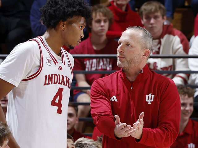 BLOOMINGTON, IN - NOVEMBER 05: Head coach Darian Devries of the Indiana Hoosiers talks to Sam Alexis #4 during a college basketball game against the Alabama A&M Bulldogs on November 05, 2025 at Simon Skjodt Assembly Hall in Bloomington, Indiana.