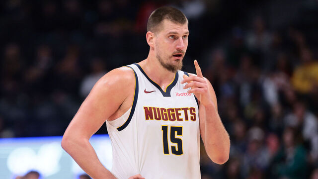 DENVER, COLORADO - NOVEMBER 05: Nikola Joki #15 of the Denver Nuggets reacts during the fourth quarter against the Miami Heat at Ball Arena on November 5, 2025 in Denver, Colorado.
