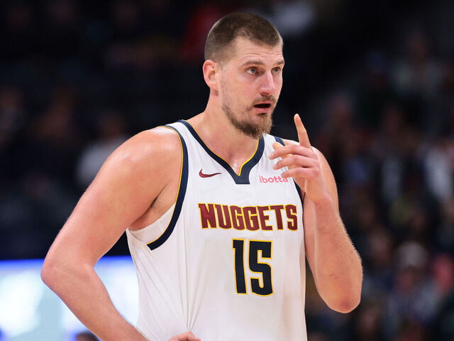 DENVER, COLORADO - NOVEMBER 05: Nikola Joki #15 of the Denver Nuggets reacts during the fourth quarter against the Miami Heat at Ball Arena on November 5, 2025 in Denver, Colorado.