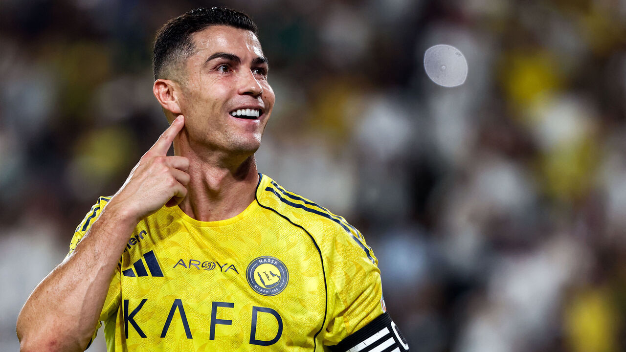TOPSHOT - Nassr's Portuguese forward #07 Cristiano Ronaldo celebrates after scoring a goal during the Saudi Pro League football match between Al-Nassr and Al-Riyadh SC at Al-Awwal Park in Riyadh on September 20, 2025.
