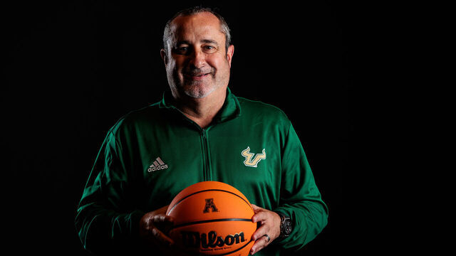 ARLINGTON, TEXAS - OCTOBER 13: Jose Fernandez head coach of the University of South Florida poses for a photo during the American Athletic Conference Basketball Media day at The Westin Irving Convention Center at Las Colinas on October 13, 2024 in Irving, Texas.