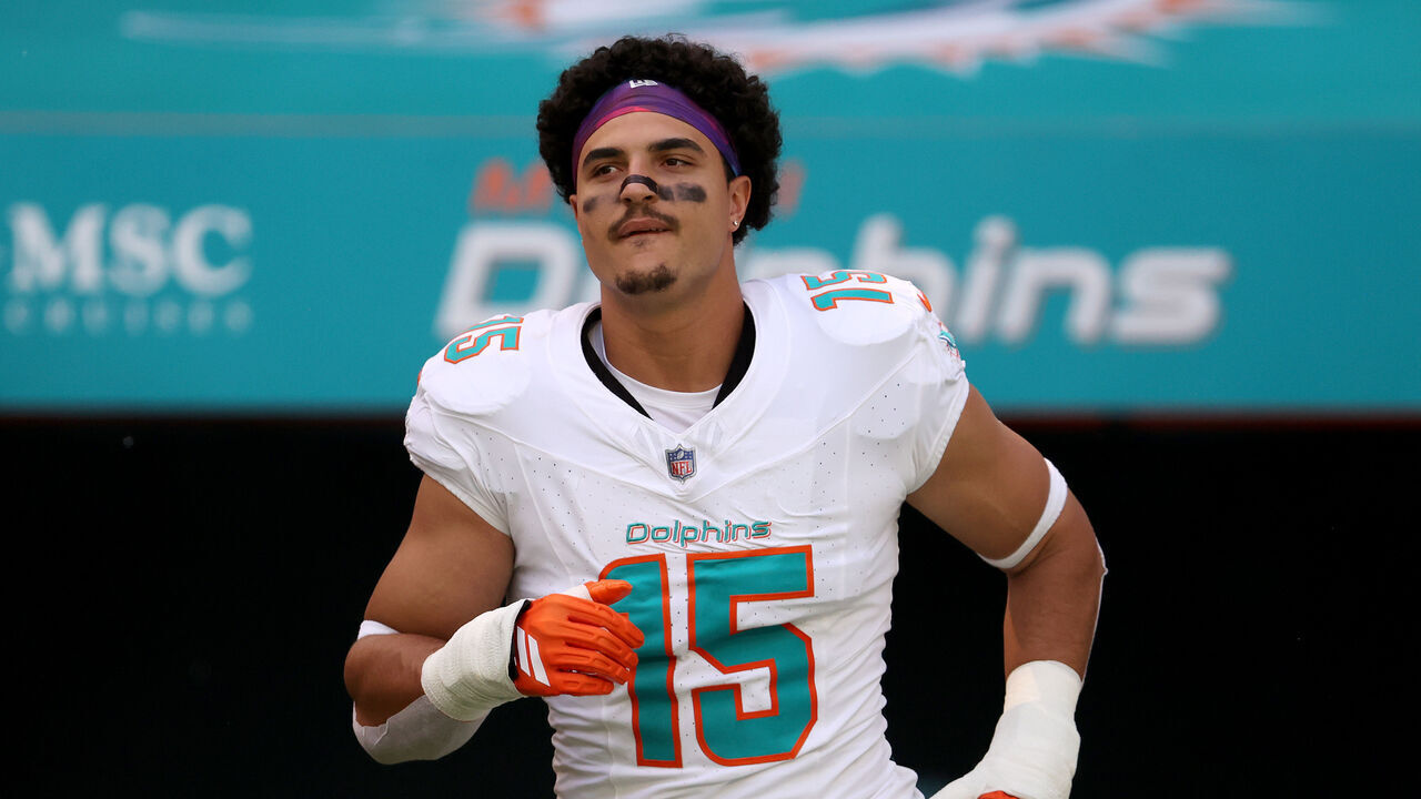 MIAMI GARDENS, FLORIDA - OCTOBER 12: Jaelan Phillips #15 of the Miami Dolphins takes on the field prior to the game against the Los Angeles Chargers at Hard Rock Stadium on October 12, 2025 in Miami Gardens, Florida.