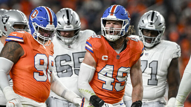 DENVER , CO - NOVEMBER 6: Alex Singleton (49) of the Denver Broncos roars after making a stop against the Las Vegas Raiders during the second quarter at Empower Field at Mile High Stadium on Thursday, November 6, 2025.