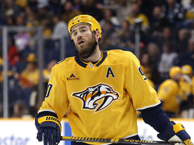 NASHVILLE, TENNESSEE - OCTOBER 28: Ryan O'Reilly #90 of the Nashville Predators reacts to a play during the third period of the game against the Tampa Bay Lightning at Bridgestone Arena on October 28, 2025 in Nashville, Tennessee.