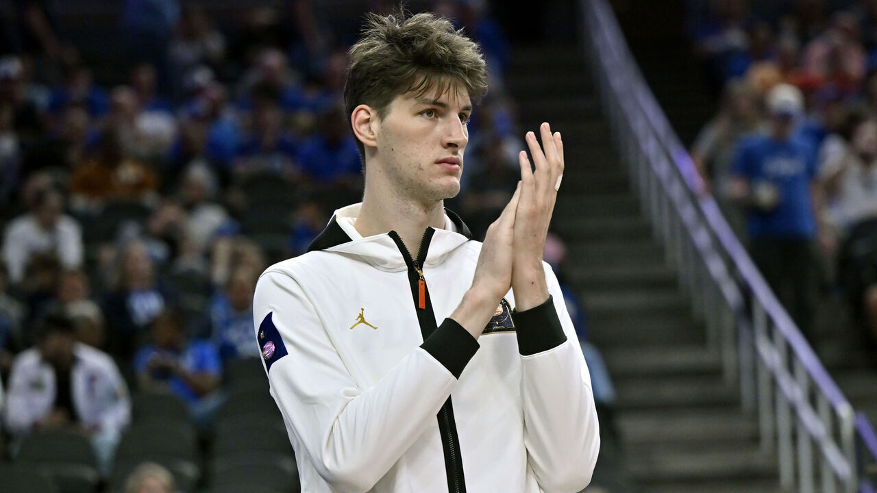 LAS VEGAS, NEVADA - NOVEMBER 03: Olivier Rioux #32 of the Florida Gators looks on from the bench during the first half of a Hall of Fame Series game against the Arizona Wildcats at T-Mobile Arena on November 03, 2025 in Las Vegas, Nevada. The Wildcats defeated the Gators 93-87.