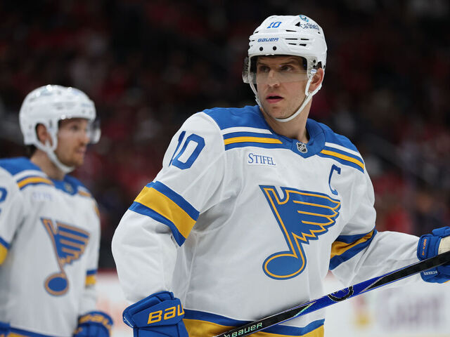 WASHINGTON, DC - NOVEMBER 05: Brayden Schenn #10 of the St. Louis Blues looks on against the Washington Capitals during the first period at Capital One Arena on November 5, 2025 in Washington, DC.